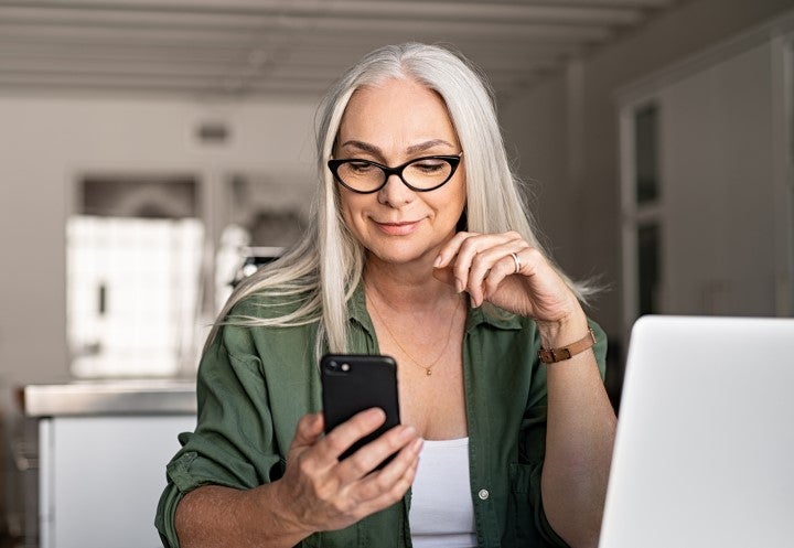 Lady looking at her mobile phone