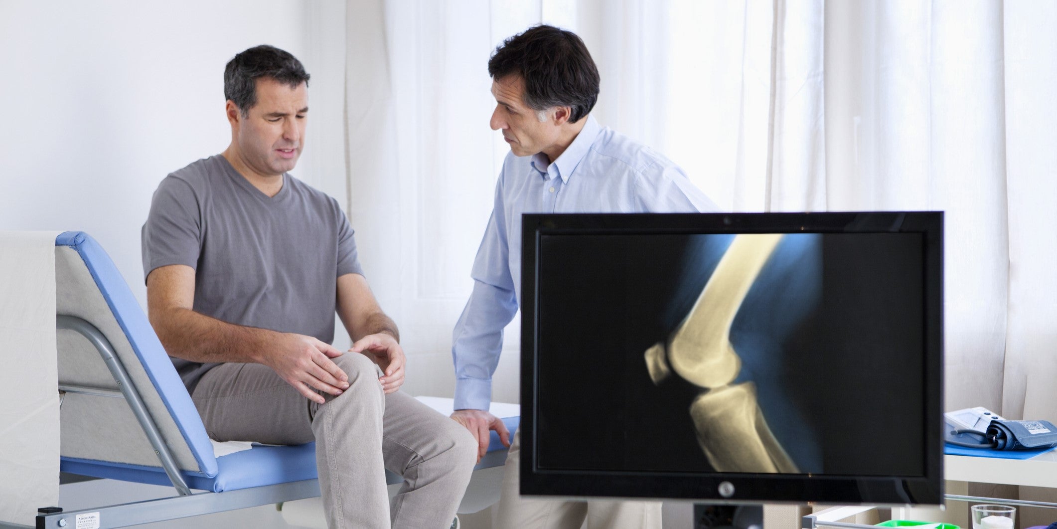Man experiencing joint pain