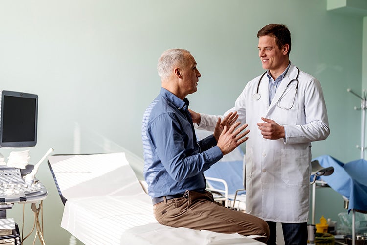 Man talking with doctor