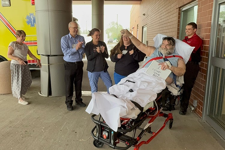 Sam Davis leaving hospital